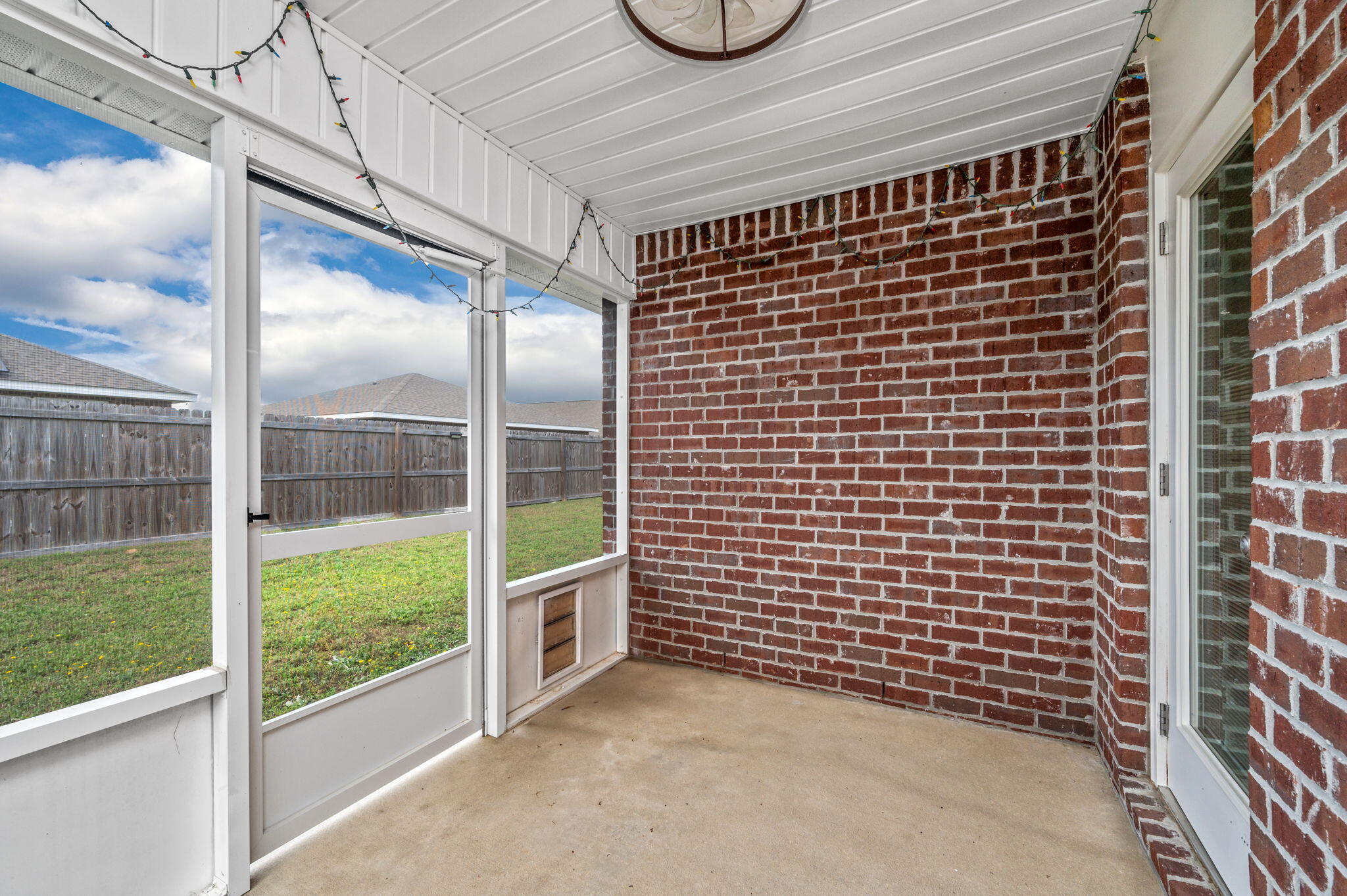 920 Merganser Way Crestview, FL 32539 - Photo 33 of 39 a view of a door with a wooden fence
