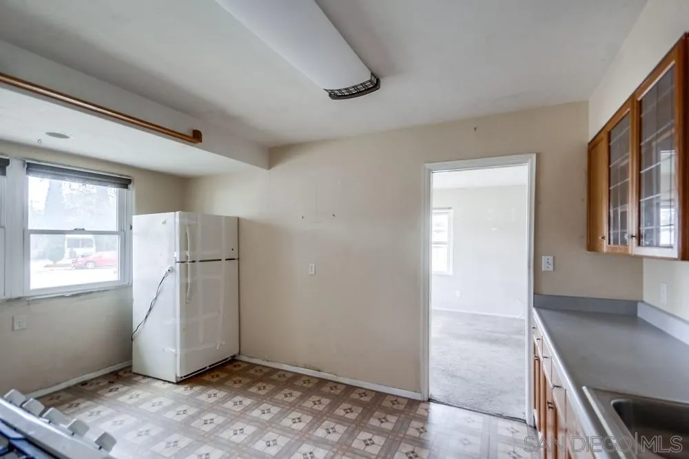 6316 Streamview Drive San Diego, CA 92115 - Photo 20 of 52 a view of livingroom with window