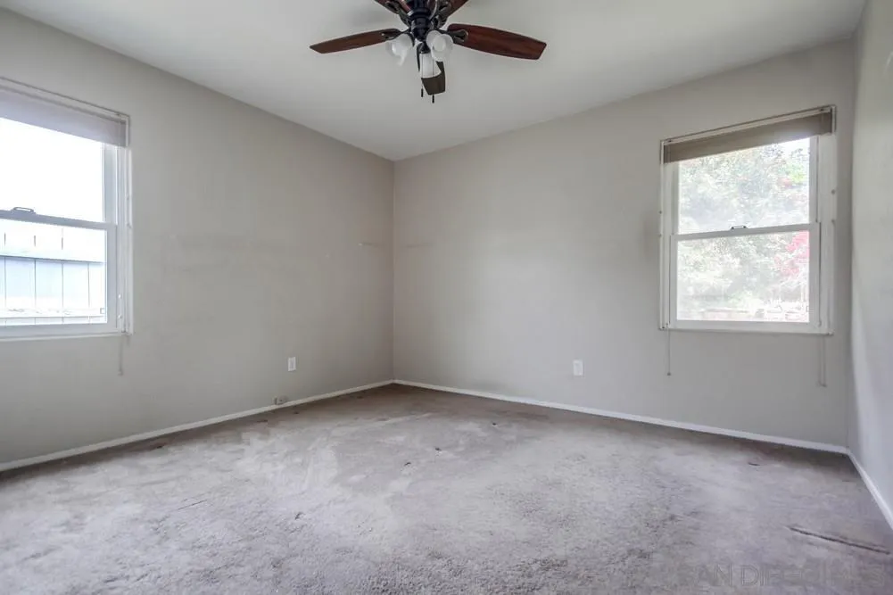 6316 Streamview Drive San Diego, CA 92115 - Photo 25 of 52 an empty room with a window