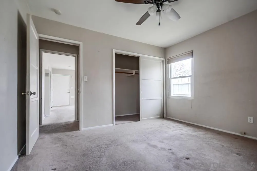 6316 Streamview Drive San Diego, CA 92115 - Photo 27 of 52 a view of an empty room with a window