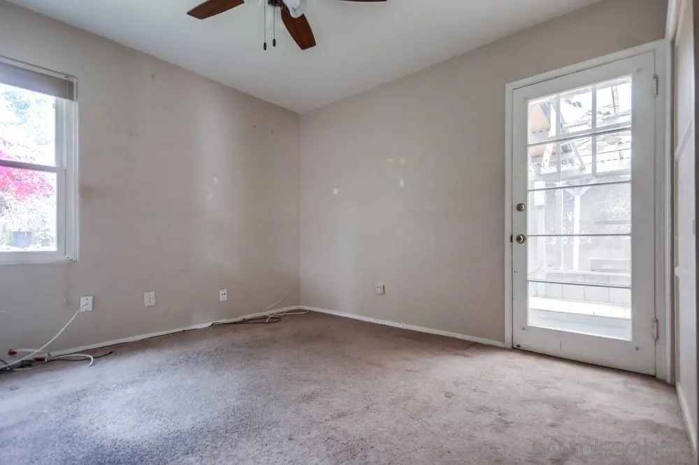 6316 Streamview Drive San Diego, CA 92115 - Photo 30 of 52 an empty room with a window