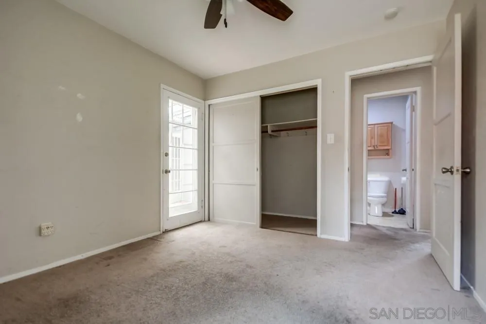 6316 Streamview Drive San Diego, CA 92115 - Photo 31 of 52 a view of empty room with ceiling fan