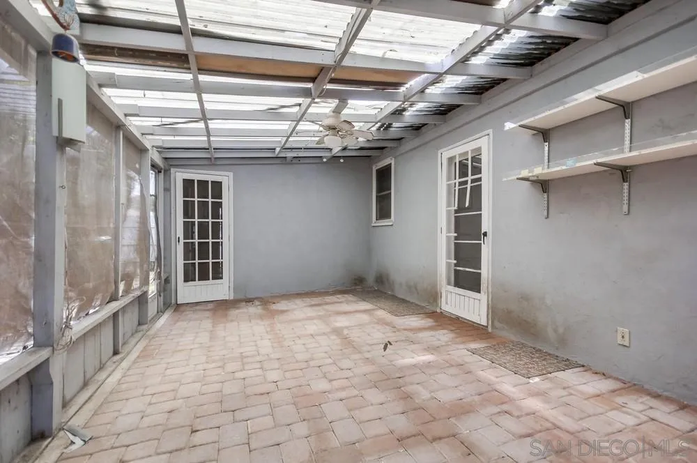 6316 Streamview Drive San Diego, CA 92115 - Photo 35 of 52 a view of an empty room with a windows