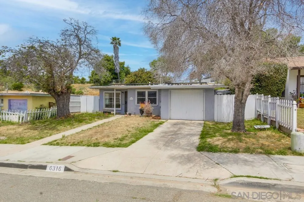 6316 Streamview Drive San Diego, CA 92115 - Photo 4 of 52 front view of a house with a chairs