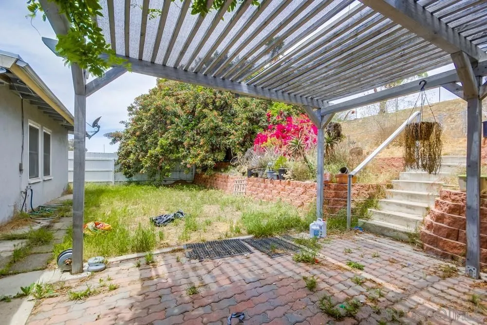 6316 Streamview Drive San Diego, CA 92115 - Photo 44 of 52 a front view of a house with a yard