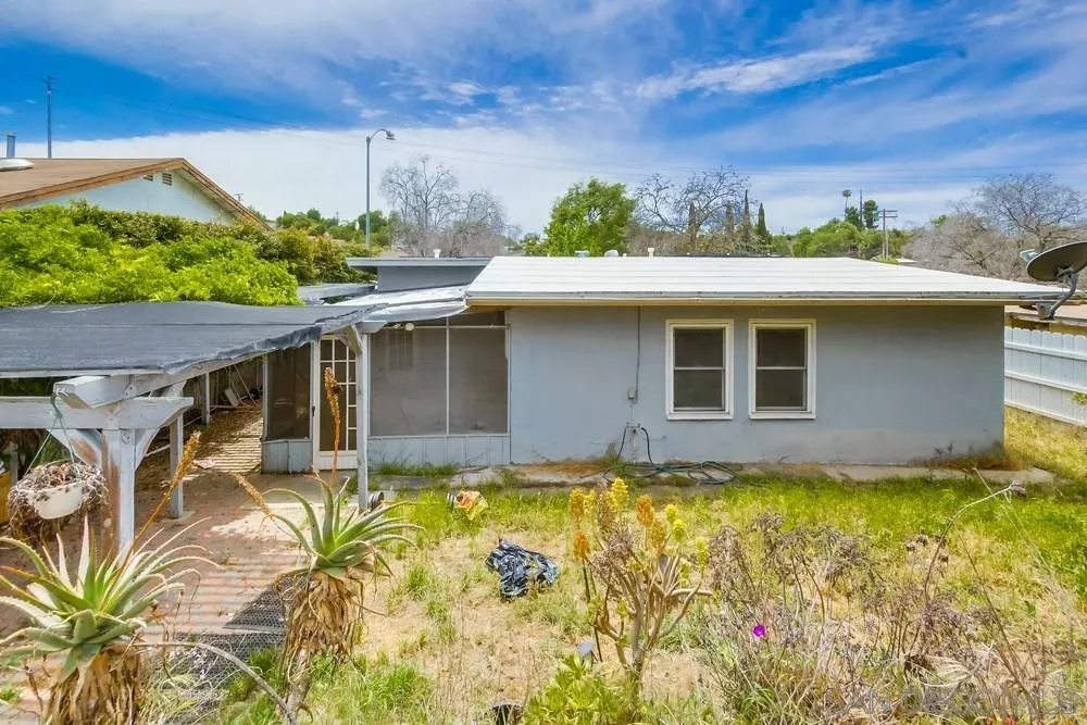 6316 Streamview Drive San Diego, CA 92115 - Photo 48 of 52 a view of a house with a yard