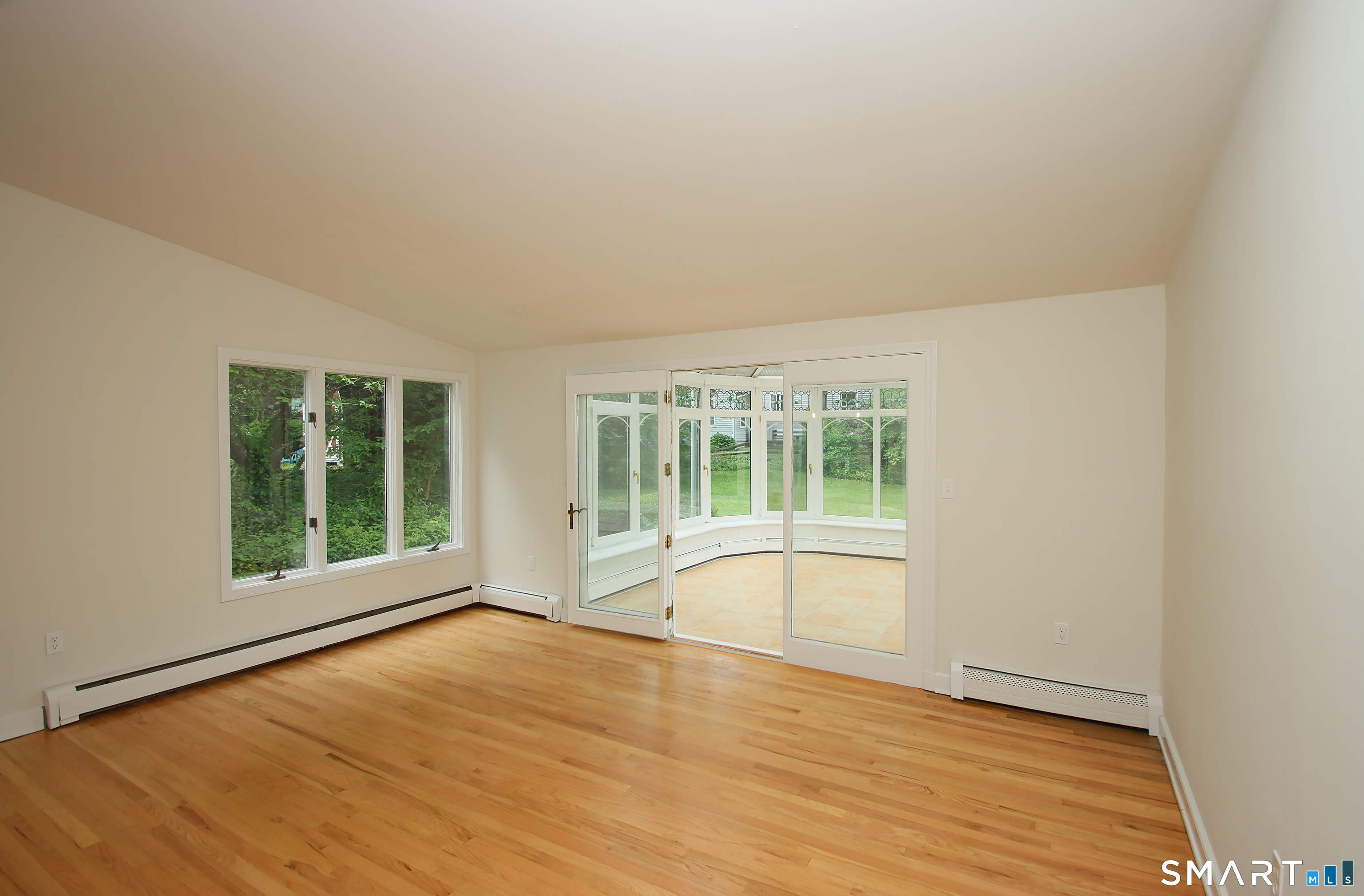 23 Norway Road North Haven, CT 06473 - Photo 13 of 32 an empty room with wooden floor and windows