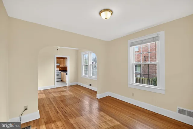 a kitchen with a stove and a refrigerator
