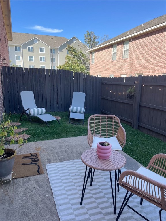 910 Monte Carlo College Station, TX 77840 - Photo 12 of 20 a view of a chairs and table in backyard of the house