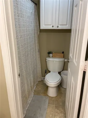 a bathroom with a toilet