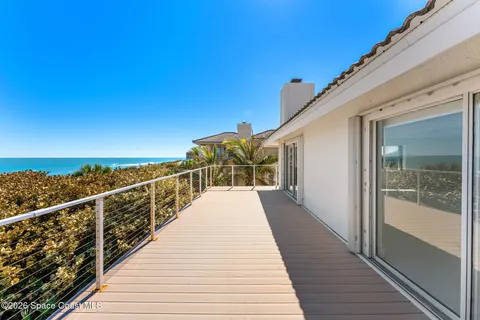a view of a kitchen with furniture and window