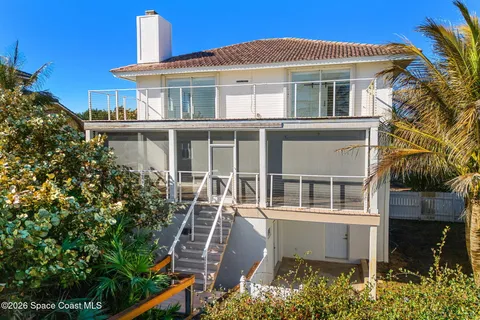 a view of balcony with ocean view