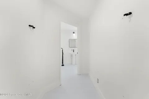 a aerial view of a house with a yard