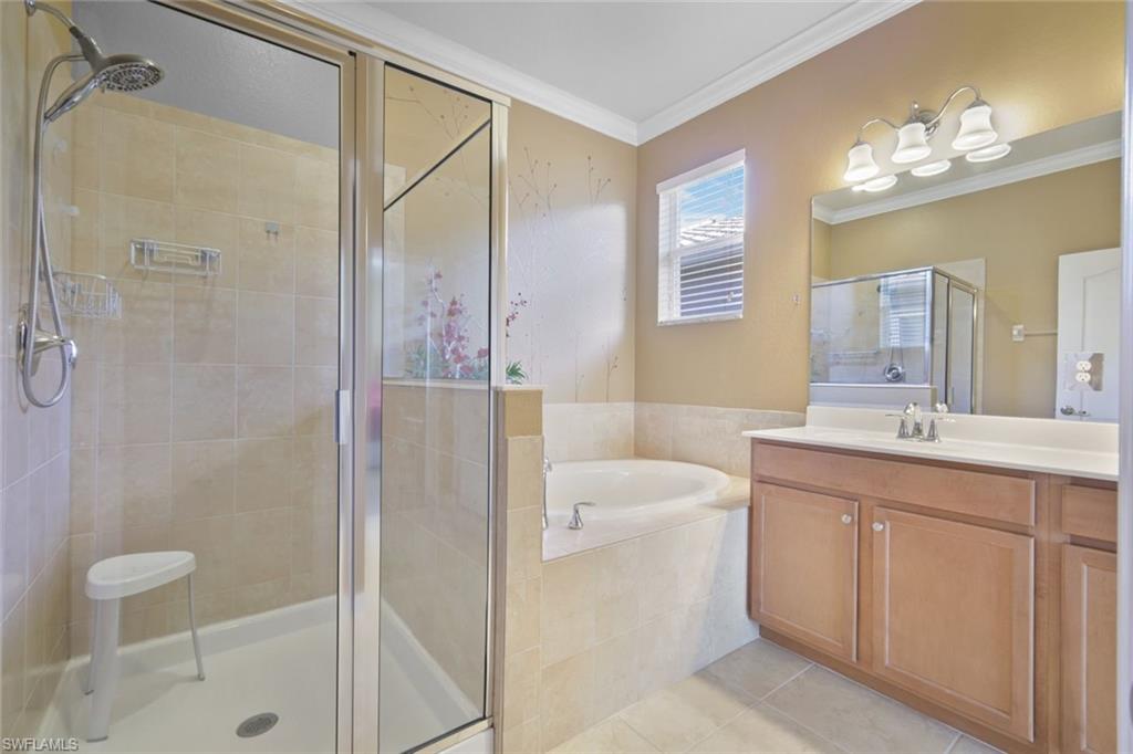 21025 Bella Terra Boulevard Estero, FL 33928 - Photo 14 of 35 a bathroom with a sink a toilet and shower