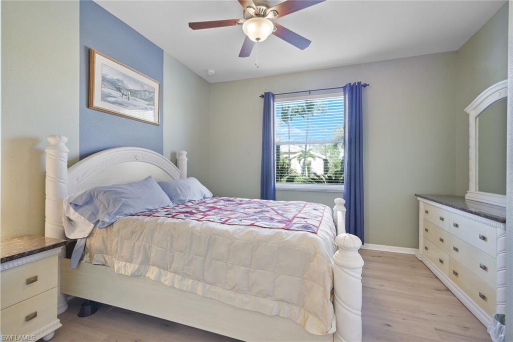 21025 Bella Terra Boulevard Estero, FL 33928 - Photo 17 of 35 a bedroom with a bed and a window
