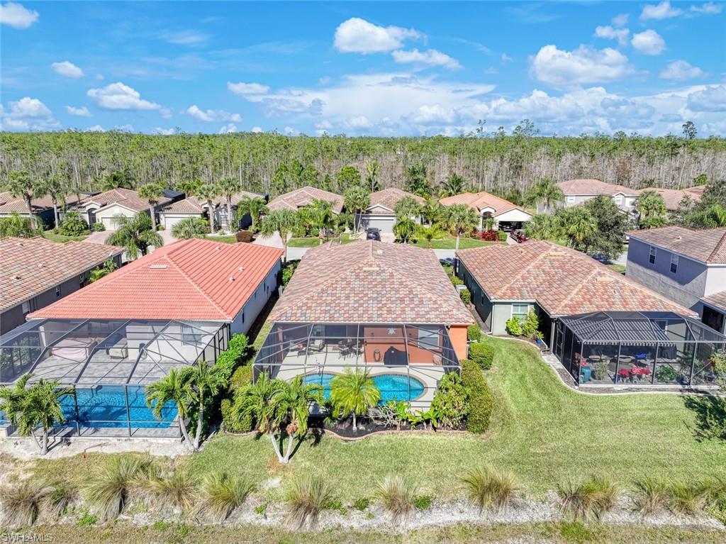 21025 Bella Terra Boulevard Estero, FL 33928 - Photo 28 of 35 an aerial view of multiple house