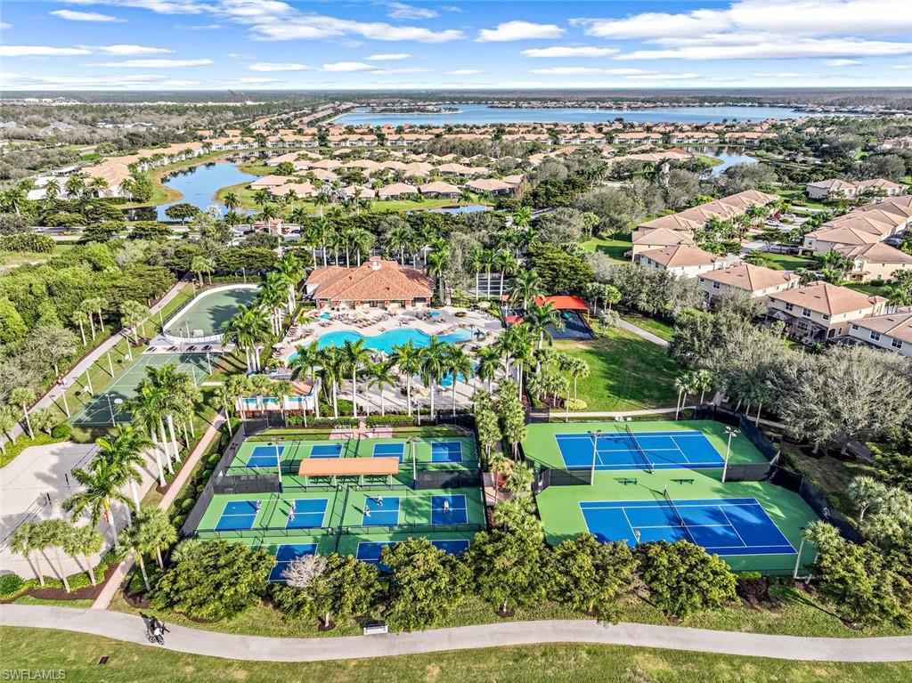 21025 Bella Terra Boulevard Estero, FL 33928 - Photo 34 of 35 an aerial view of residential houses with outdoor space and swimming pool