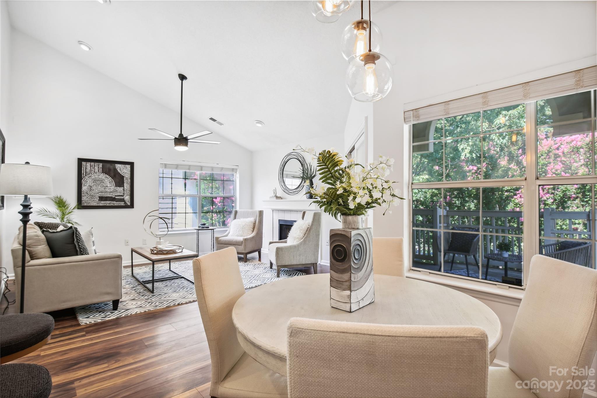 5007 Sharon Road, Unit E Charlotte, NC 28210 - Photo 13 of 30 a living room with furniture and a large window