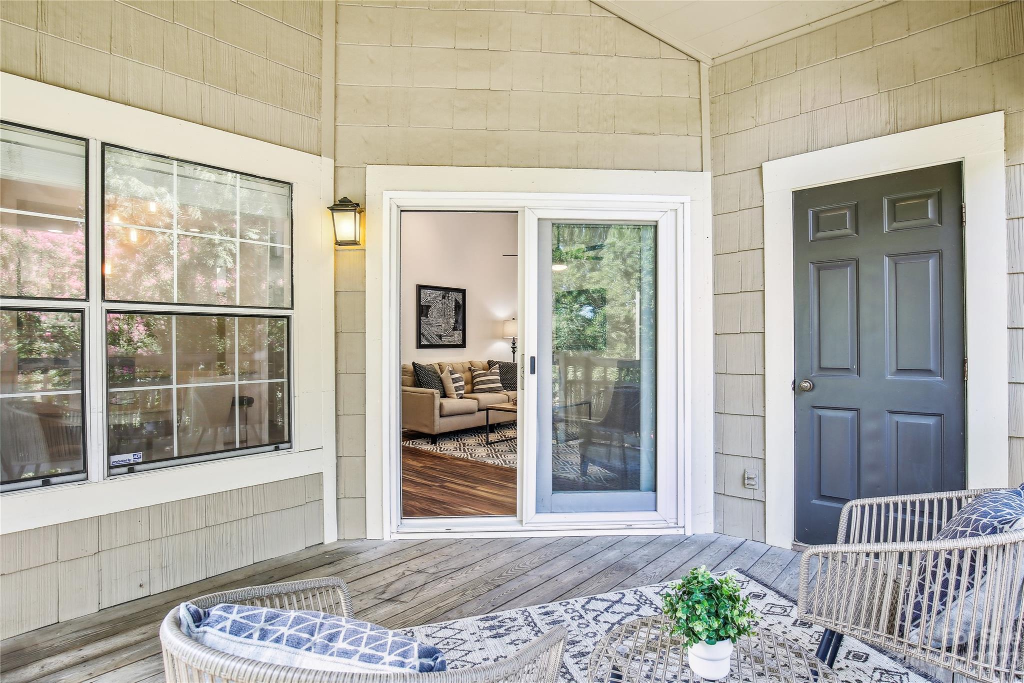 5007 Sharon Road, Unit E Charlotte, NC 28210 - Photo 16 of 30 a bedroom with a bed and wooden floor