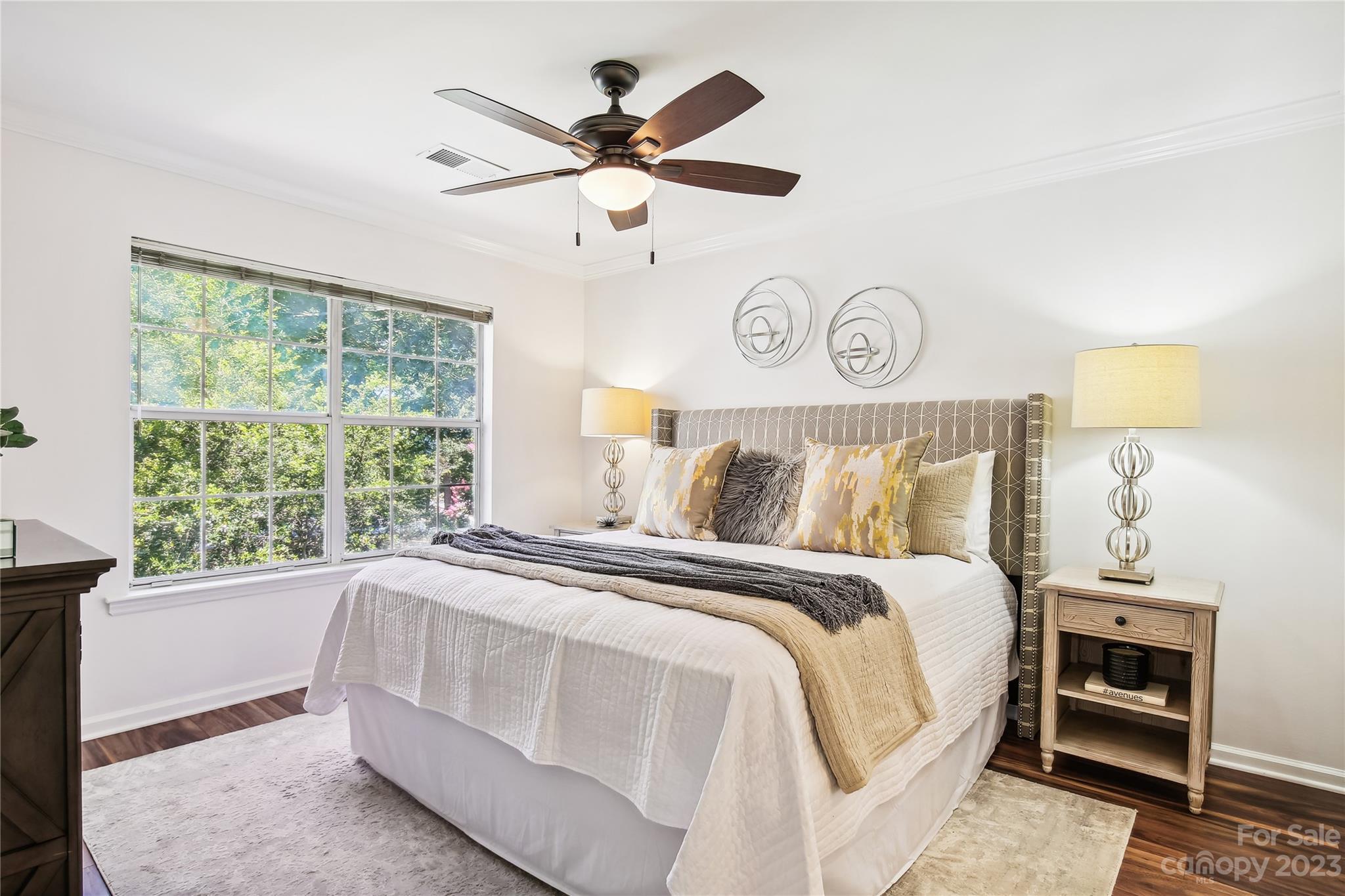 5007 Sharon Road, Unit E Charlotte, NC 28210 - Photo 17 of 30 a bed room with a bed and a window