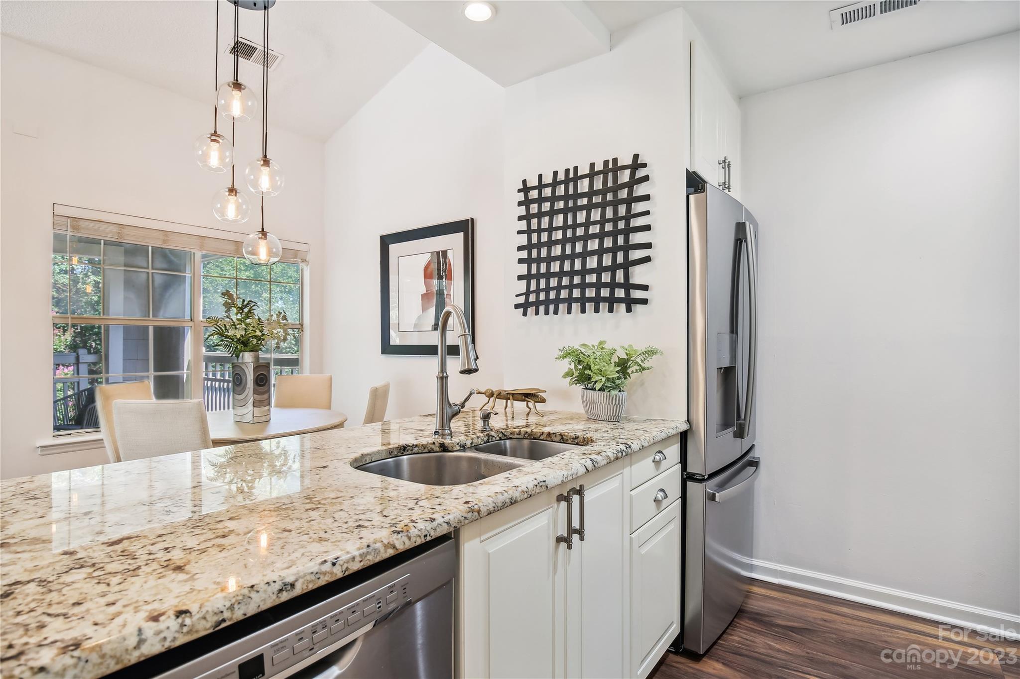 5007 Sharon Road, Unit E Charlotte, NC 28210 - Photo 7 of 30 a kitchen with sink and window