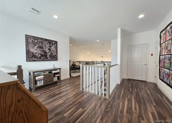 a view of a kitchen with appliances and cabinets