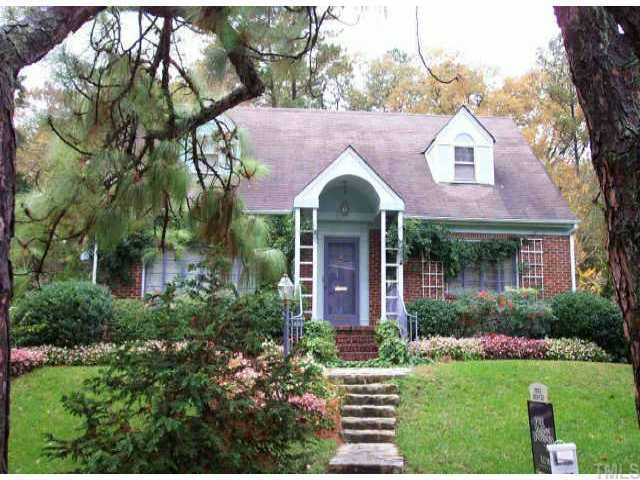1603 Pineview Street Raleigh, NC 27608 - Photo 1 of 1 a front view of a house with a yard