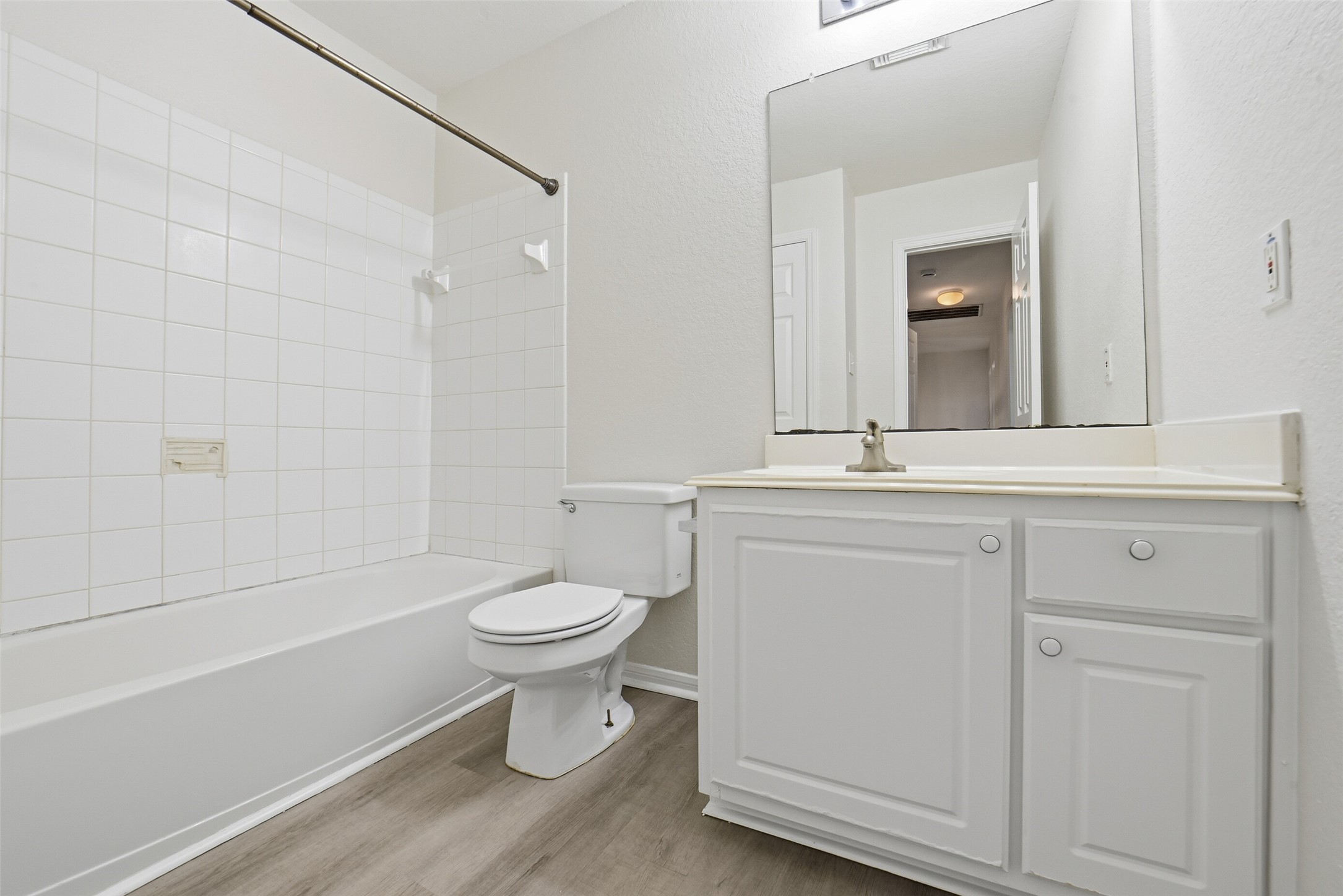 2110 Ridge Wood Lane Sugar Land, TX 77479 - Photo 22 of 26 a bathroom with a sink a toilet and shower
