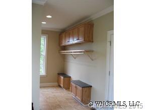 132 Sunny Ridge Road Hendersonville, NC 28739 - Photo 7 of 12 a view of a hallway with seating area