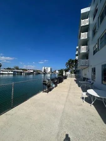 a view of a terrace with chairs