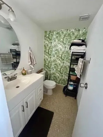 a view of bathroom with dual sinks