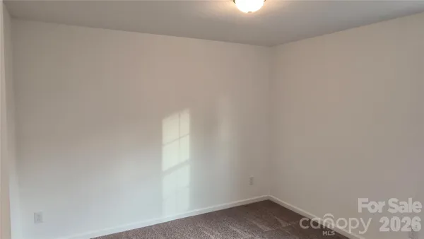 a view of small space with racks on the wall