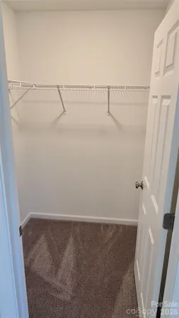 a bathroom with a toilet and a bathtub