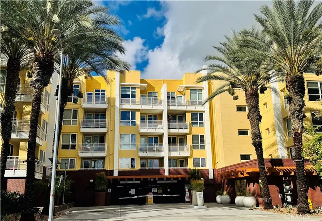 a front view of a building with street view