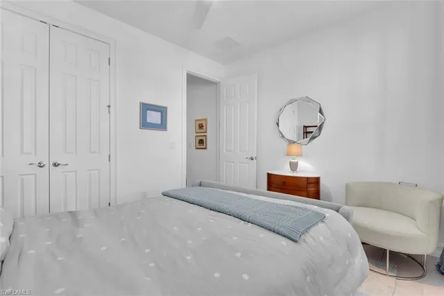 a bathroom with a sink a toilet and shower curtain