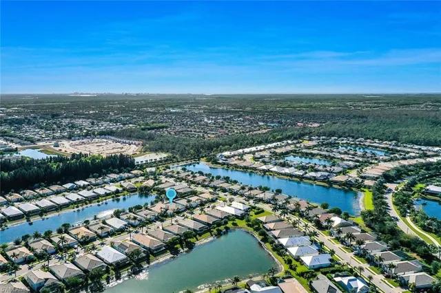an aerial view of a city with lots of residential buildings