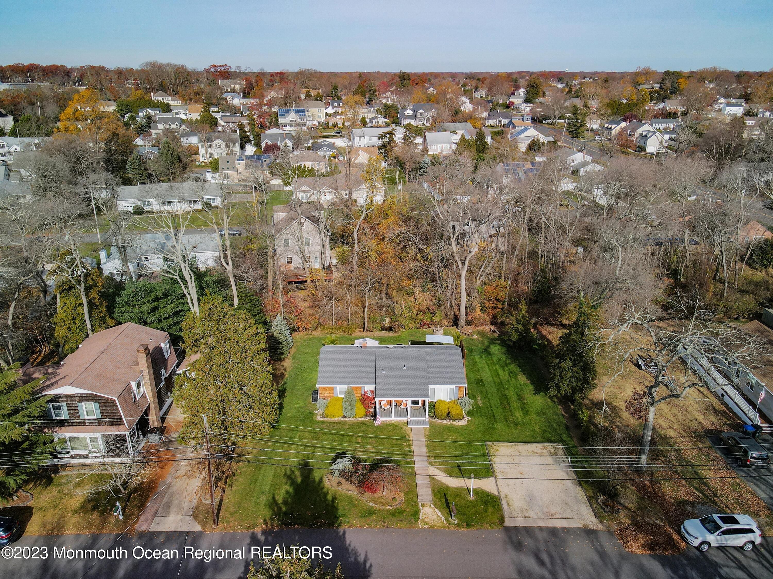 1208 Oak Road Manasquan, NJ 08736 - Photo 51 of 52 an aerial view of residential houses with outdoor space