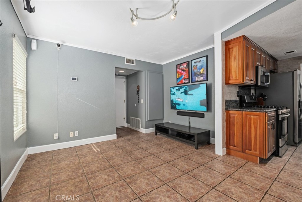 4 Firethorn Rancho Santa Margarita, CA 92688 - Photo 13 of 27 a view of a livingroom with furniture and a window