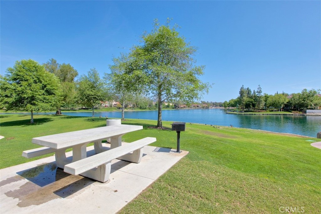 4 Firethorn Rancho Santa Margarita, CA 92688 - Photo 25 of 27 a view of a park with large trees and a wooden fence