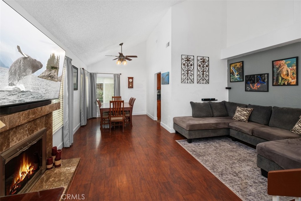 4 Firethorn Rancho Santa Margarita, CA 92688 - Photo 4 of 27 a living room with furniture and a fireplace