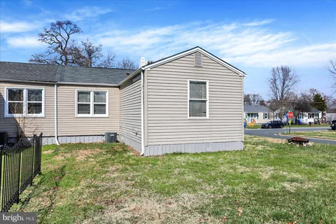 a sign board with parking space