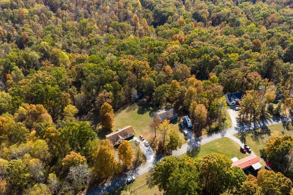 a view of a backyard of the house