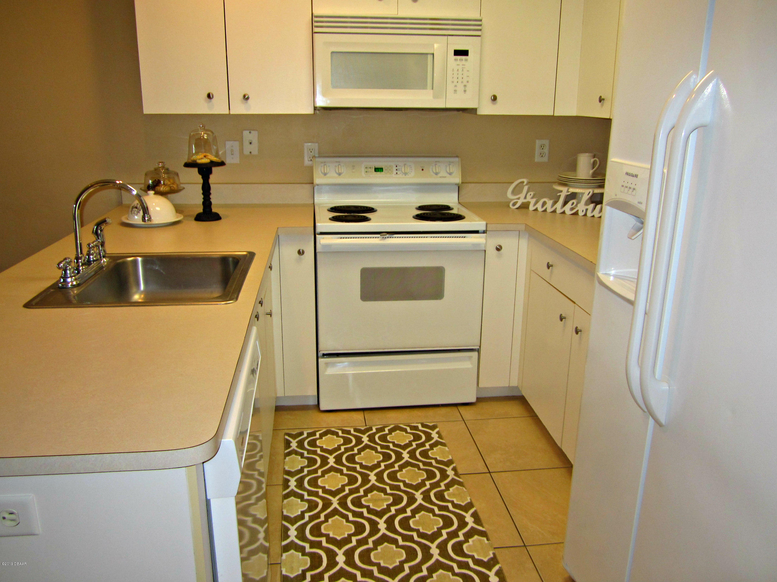 1803 Deer Springs Road Port Orange, FL 32129 - Photo 13 of 39 U-Shaped Kitchen