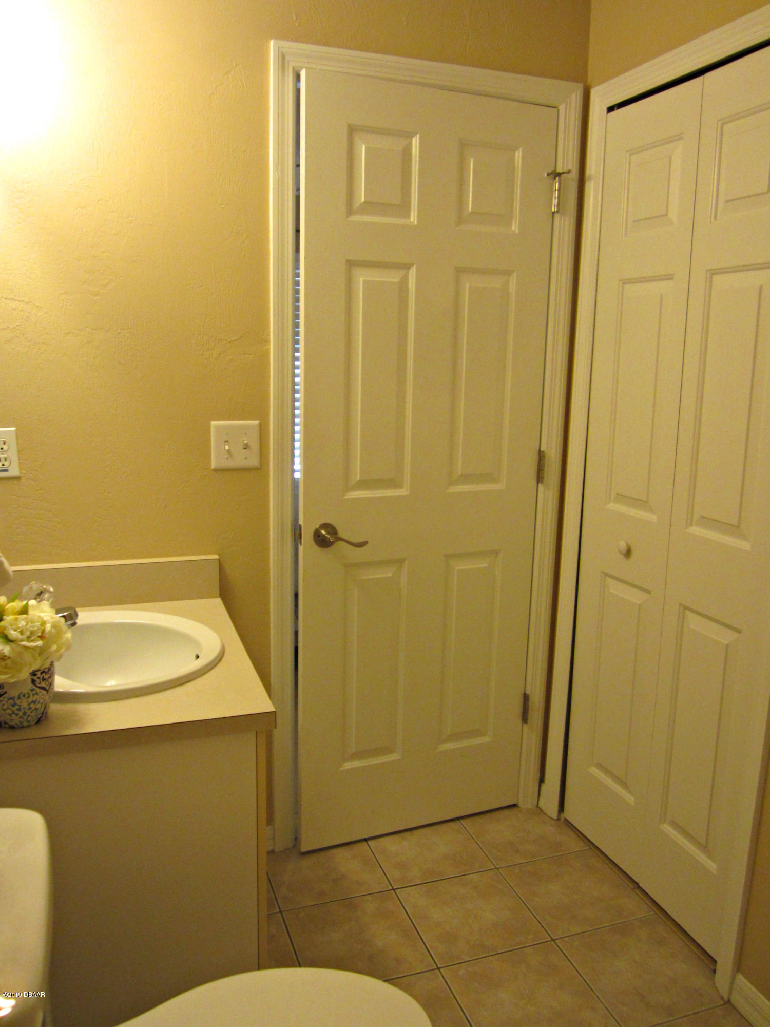 1803 Deer Springs Road Port Orange, FL 32129 - Photo 19 of 39 Master Bath Linen Closet