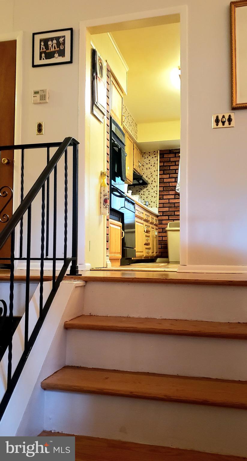 1111 Fordham Road Neptune, NJ 07753 - Photo 2 of 20 Front entryway, kitchen ahead
