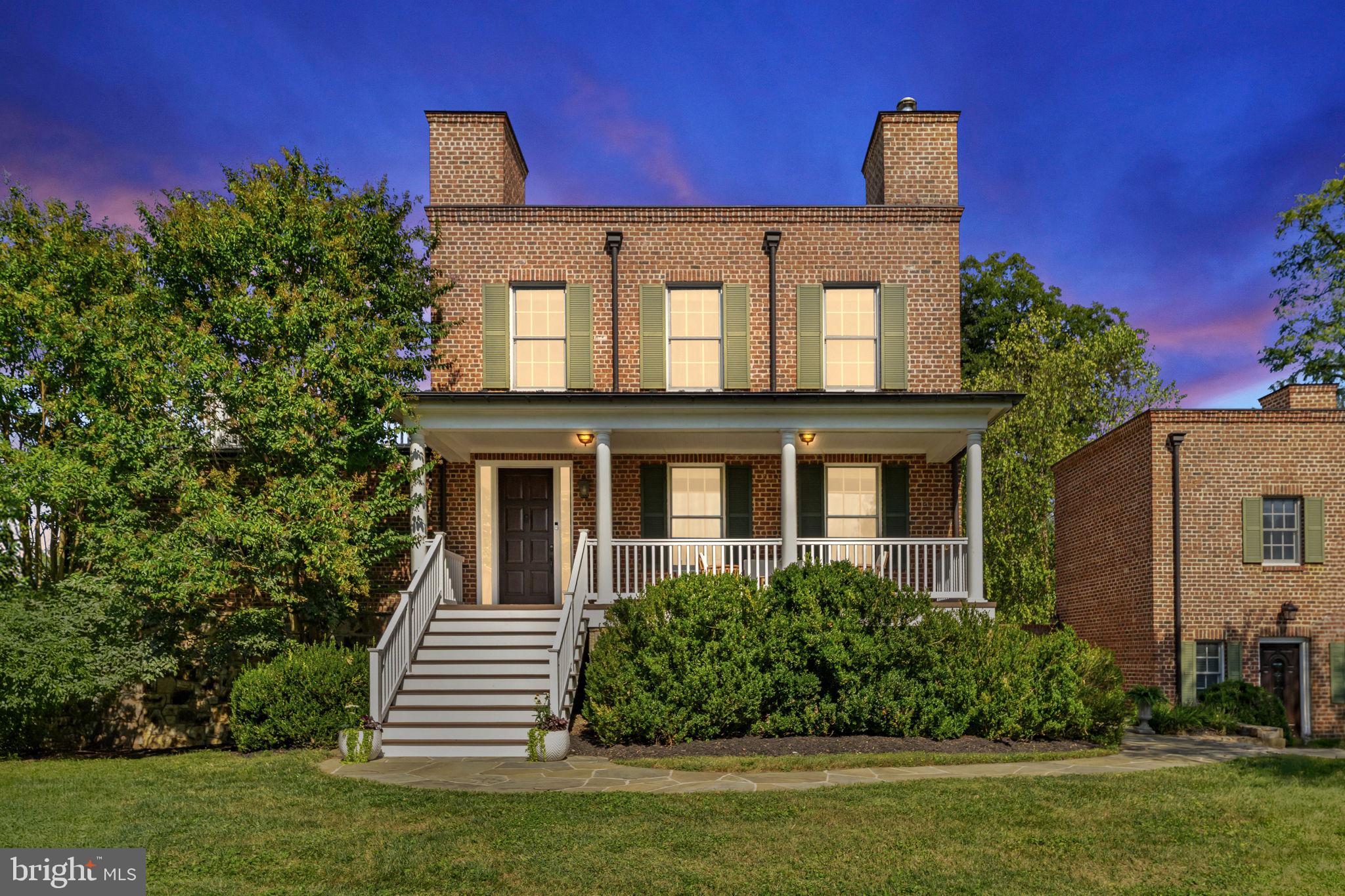 9533 Howellsville Road Boyce, VA 22620 - Photo 17 of 65 a front view of a house with a yard