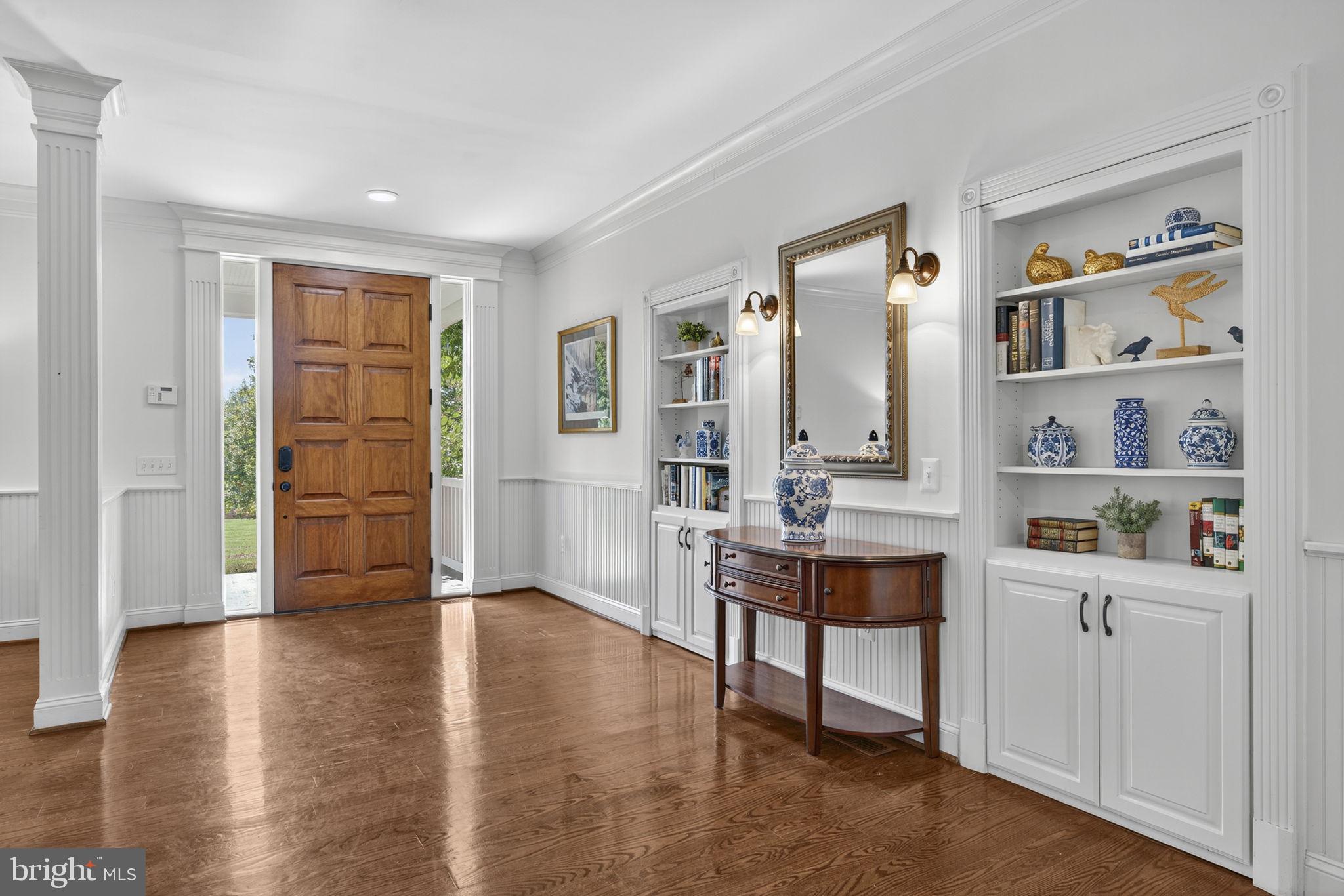 9533 Howellsville Road Boyce, VA 22620 - Photo 19 of 65 a view of a workspace with wooden floor and white cabinet