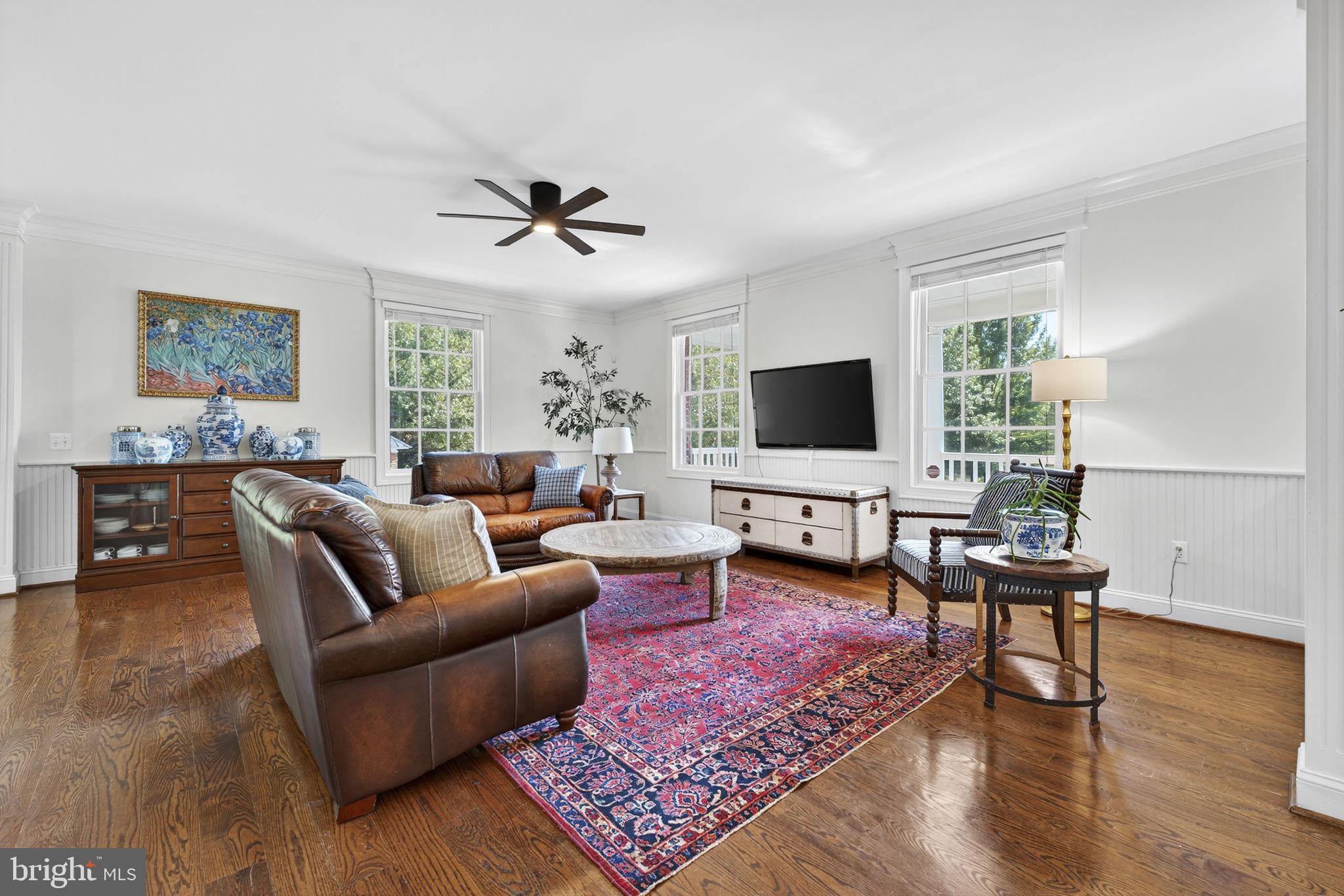 9533 Howellsville Road Boyce, VA 22620 - Photo 20 of 65 a living room with furniture and a flat screen tv