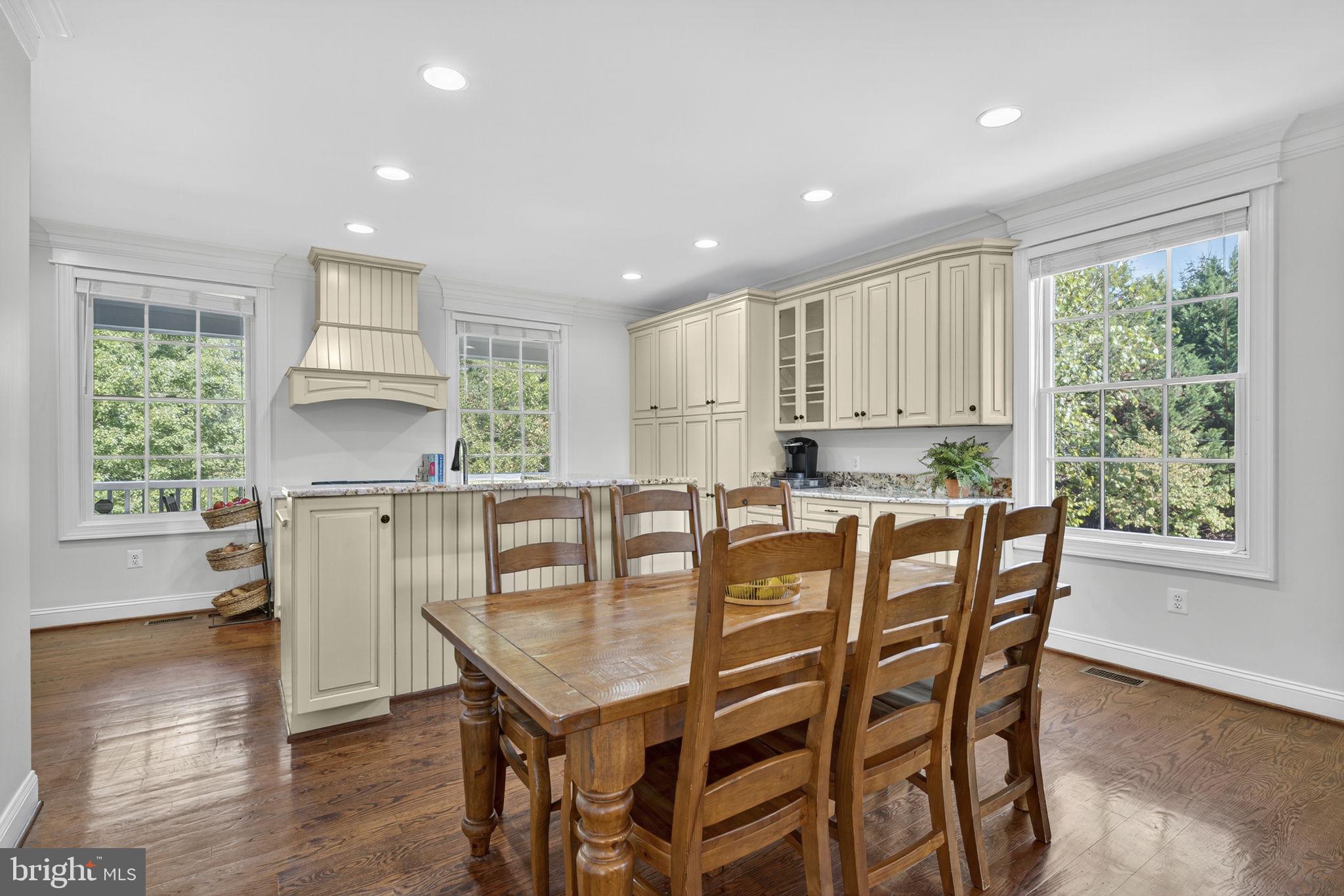 9533 Howellsville Road Boyce, VA 22620 - Photo 24 of 65 a view of a dining room with furniture window and wooden floor