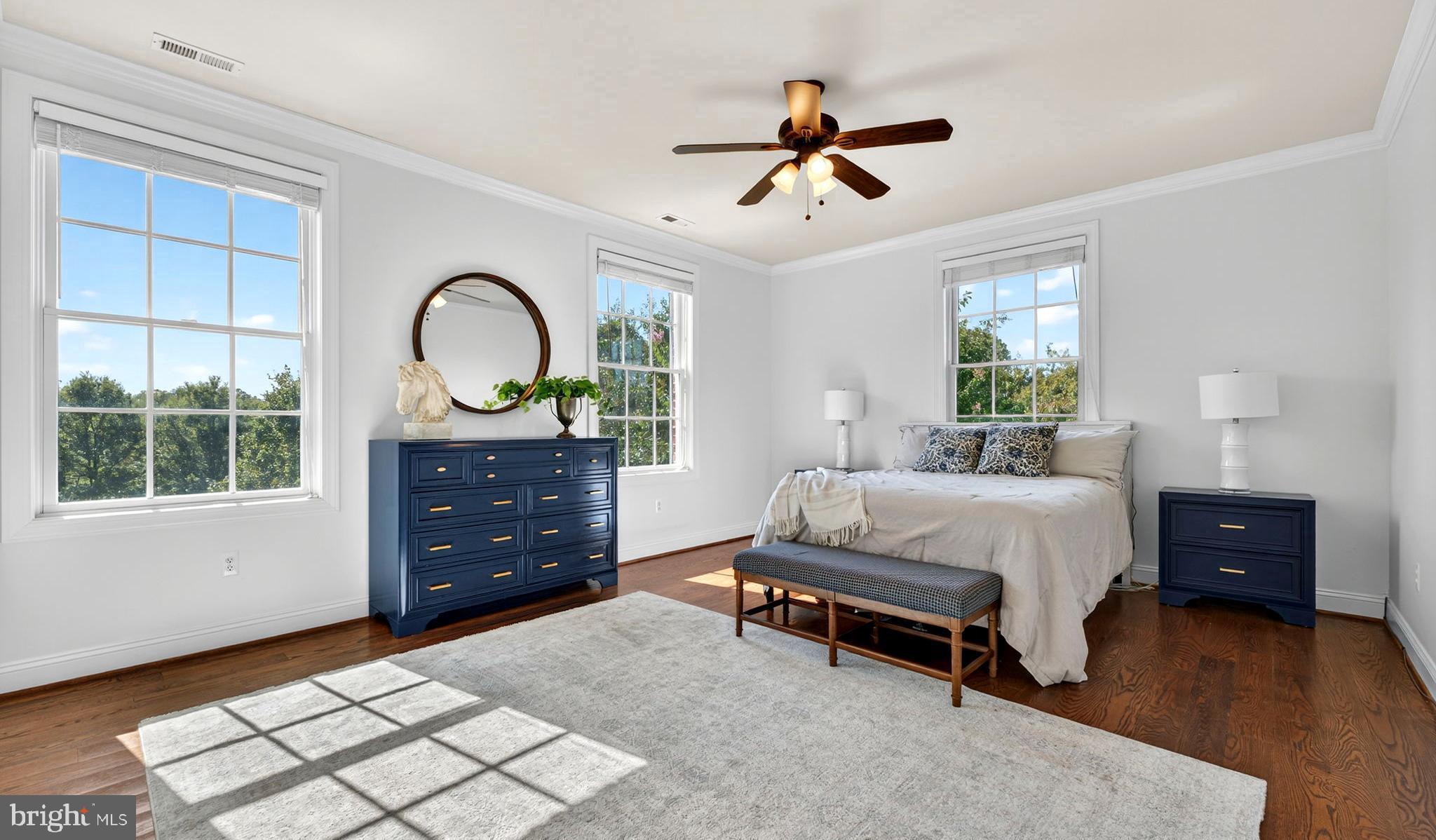 9533 Howellsville Road Boyce, VA 22620 - Photo 30 of 65 a spacious bedroom with a bed and a dresser